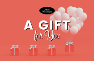 A graphic representation of a gift card to Althea's Fine Lingerie of Milwaukee. The words "A Gift For You" are overlayed on a soft orange background. There are 4 small gift boxes at the lower border of the card, with the last being floated away by a bunch of white baloons.